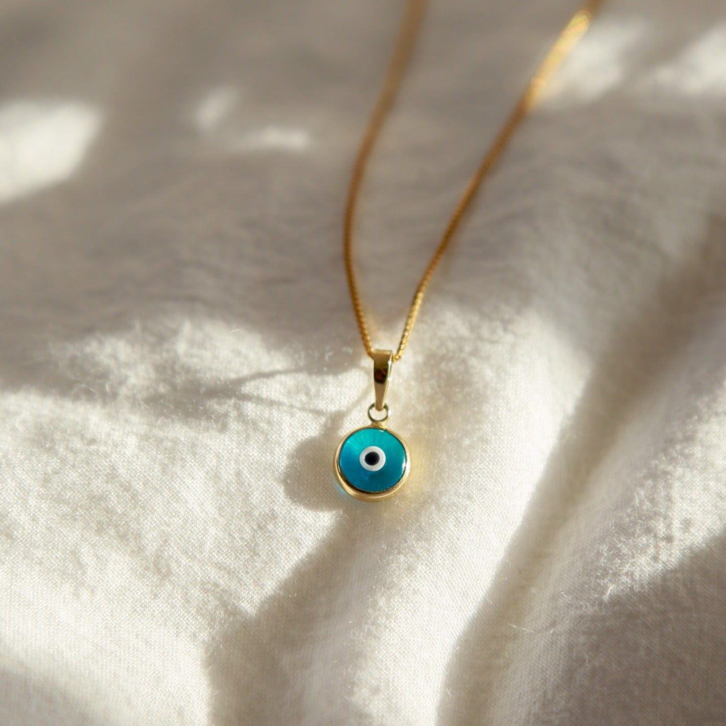 Eye of Horus CZ Pendant Necklace in Solid 10k Gold with Turquoise Ston –  Pome Jewelry